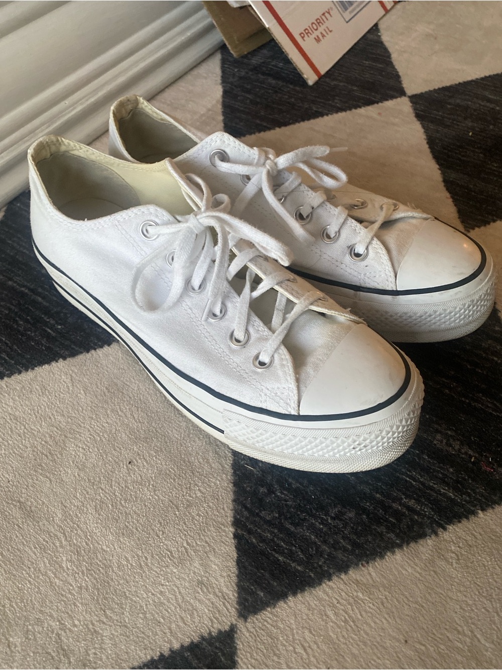Converse White Low-Top Canvas Sneakers with Black Stripe